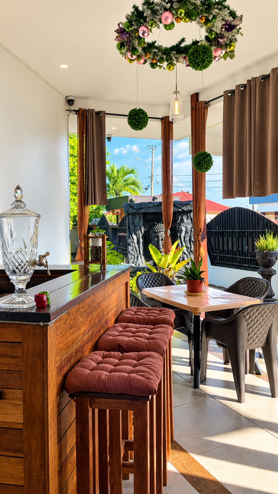 Sunny terrace with bar and tropical plants